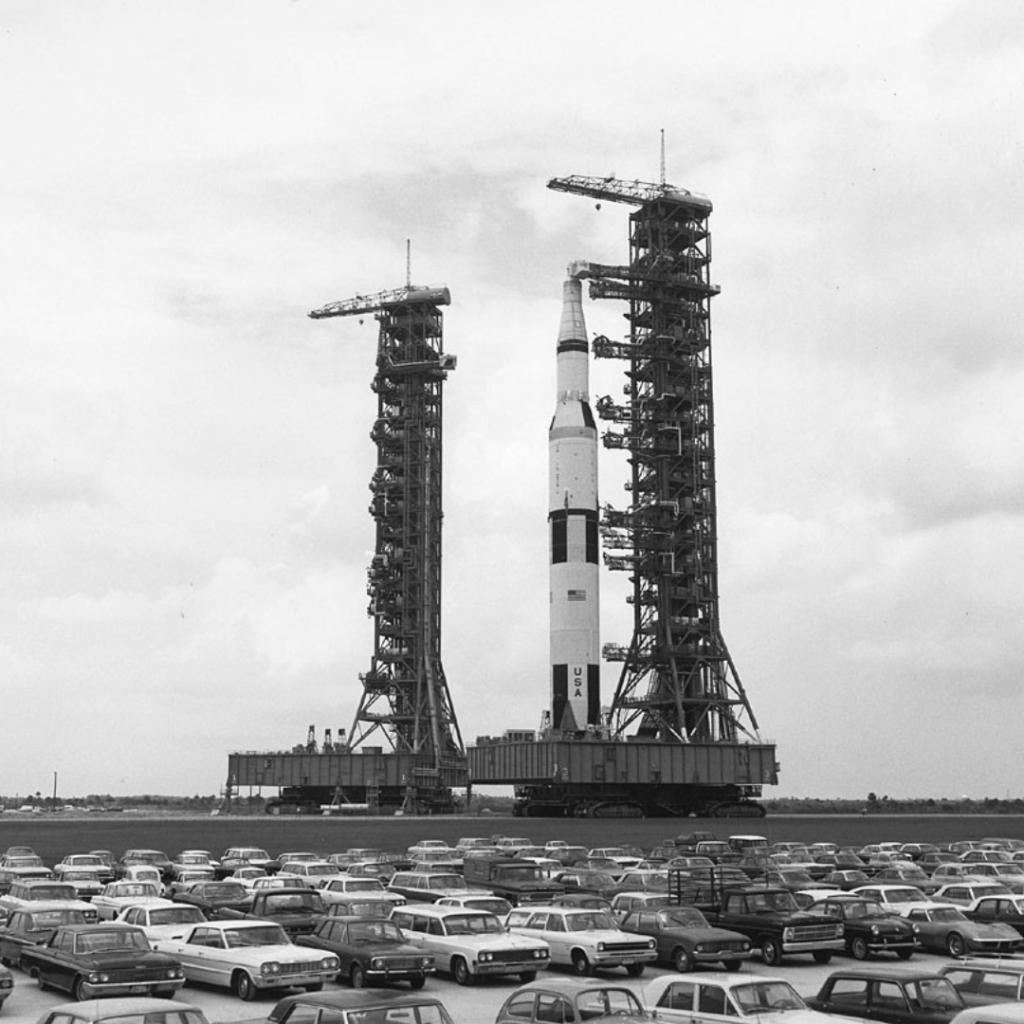 Apollo 13 Saturn V with boilerplate spacecraft during transfer move from High Bay 2 to High Bay 3. 8 August 1969. Scan by J.L. Pickering.