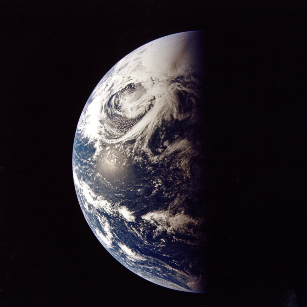 View of Earth. Scan by Kipp Teague. Journal Contributor Paul White has made detailed comparisons of cloud patterns seen in a large number of Apollo images with imagery taken at close to the same time by various meteorlogical satellites.