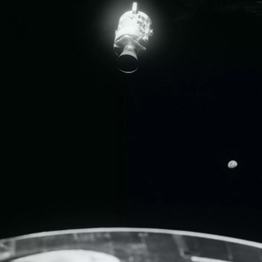 View of the top of Apollo 13 Lunar Module Aquarius after separation. The plus-Z strut with the ladder attached is at the bottom of the image. 17 April 1970. Scan by Kipp Teague.