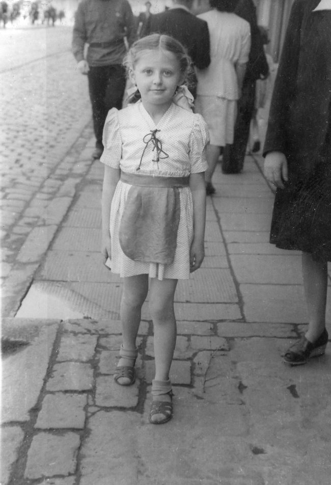 Tola, age 8, returns to Tomaszów Mazowiecki circa 1946.