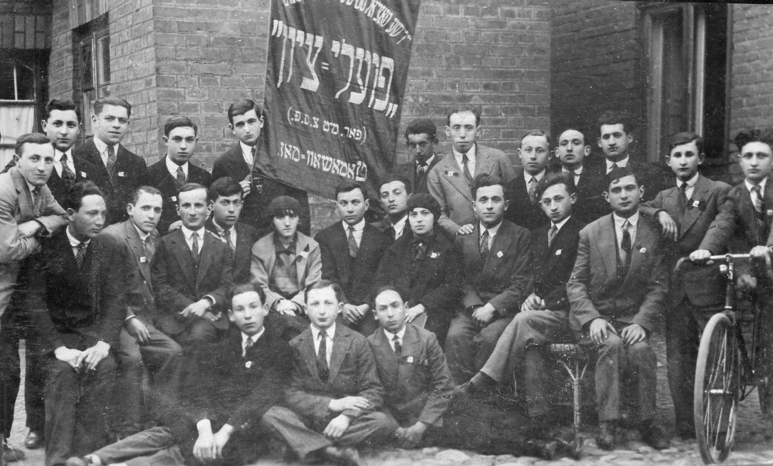 Machel Grossman, seated middle row second from the right, with his Zionist youth group, approx. 1932.