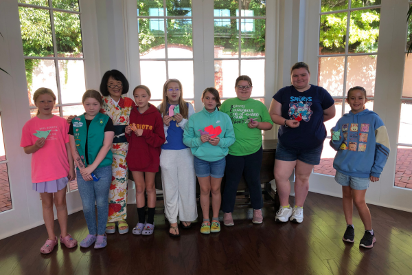 Storyteller Motoko with local girl scouts who she worked with for them to achieve their storyteller patch